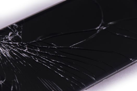 crash glass black background smartphone broken closeup