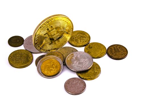 Bitcoin golden on top of other coins isolated on white background clipping path
