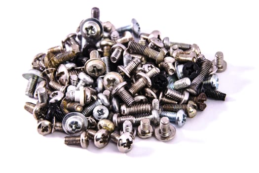  bunch of screws macro closeup on white background isolated