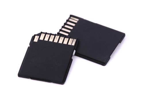 two black SD card digital storage device on white background isolated