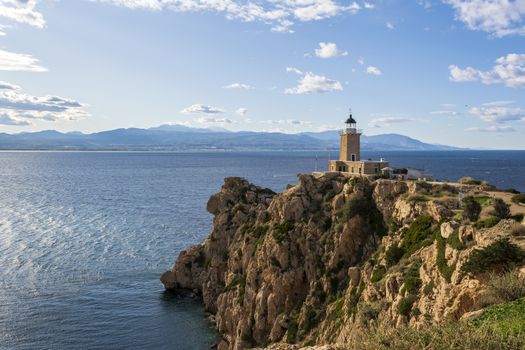 Cape Melagkavi Lighthouse also known as Cape Ireon Light on a headland overlooking eastern Gulf of Corinth, Greece.