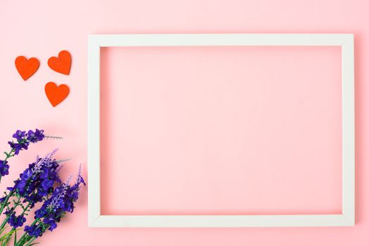 Valentine's Day Concept, Top view Flat lay, photo frame on Pink background with copy space for your text