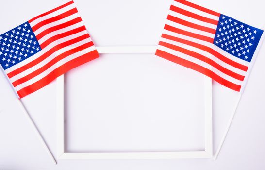 Martin luther king day, flat lay top view, American flag and photo frame on white background with copy space for your text