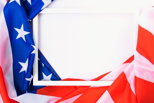 Martin luther king day, flat lay top view, American flag and photo frame on white background with copy space for your text