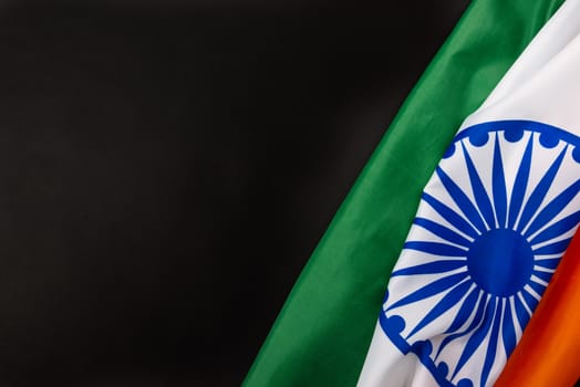 Indian republic day, flat lay top view, Indian flag on black background with copy space for your text