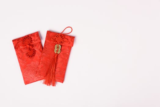 Chinese new year festival concept, flat lay top view, Happy Chinese new year with Red envelope (Character "FU" means fortune, blessing) on white background with copy space for text