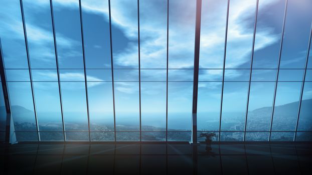 Large panoramic window in the modern office with a view of coastal landscape.