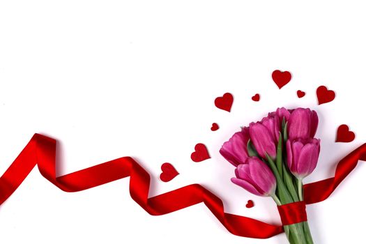 Valentines day hearts and pink tulip flowers isolated on white background