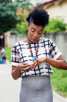 portrait of young businesswoman playing with her fingers.