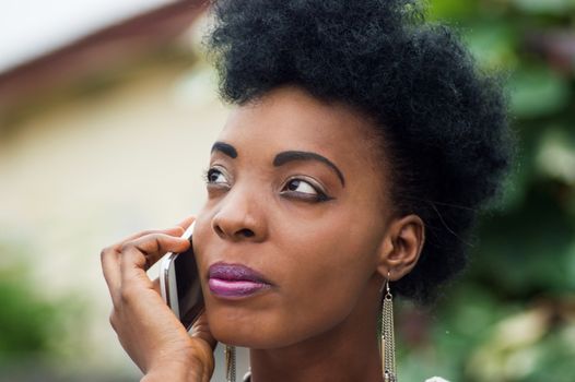 Close-up of a young woman focused on her communication