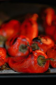 Red tasty peppers roasted in oven