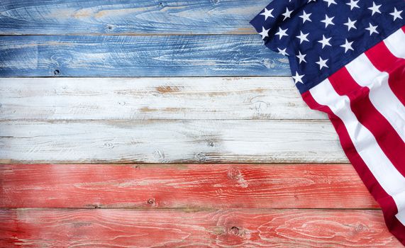 United States flag on red, white and blue rustic wooden boards with plenty of copy space 