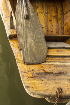 Old wooden paddle in small boat on West Lake in Hangzhou China 