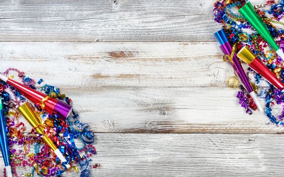 New Year party decorations on rustic wood in flat lay view