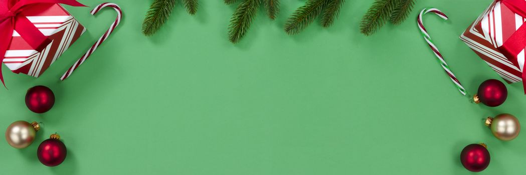 Green background with decorations for the Christmas season 