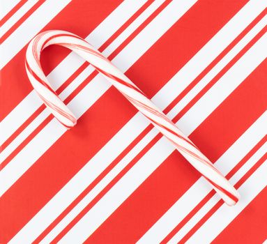Christmas striped pattern with candy cane in filled frame format background 