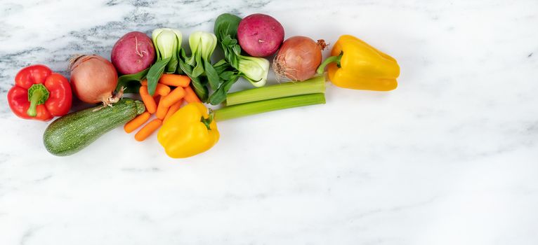 Raw organic vegetables on marble stone background for healthy diet concept