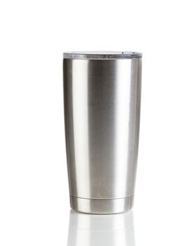 Stainless steel cup isolated on a white background with reflection 