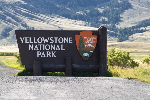 Closeup horizontal image of Yellowstone National Park sign at the north entrance in Montana 