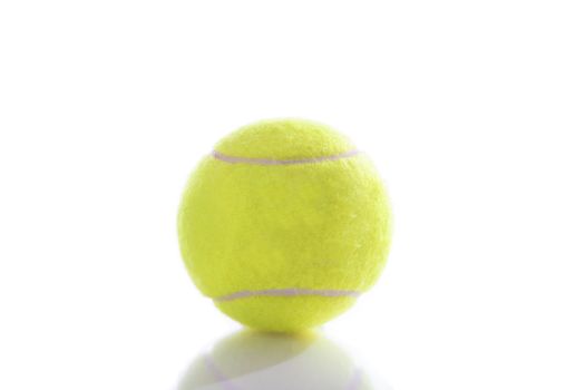 Tennis ball isolated on white background with reflection 