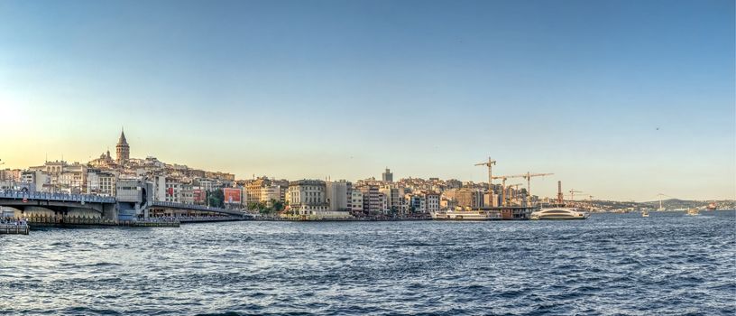 Istambul, Turkey – 07.12.2019. Panoramic view of Galata Bridge and Galata Tower in istanbul on a sunny summer evening