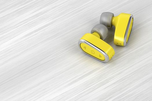 Yellow wireless in-ear headphones on wood table