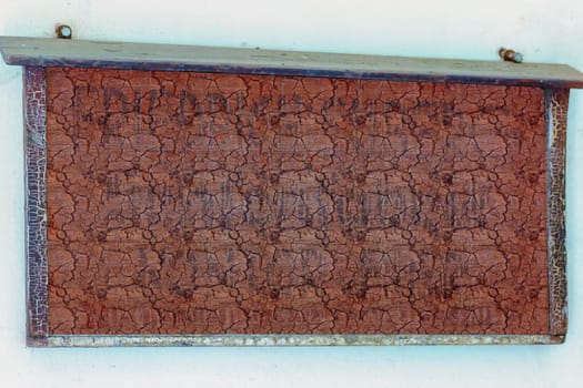 
Wooden sign without lettering with textured pattern
