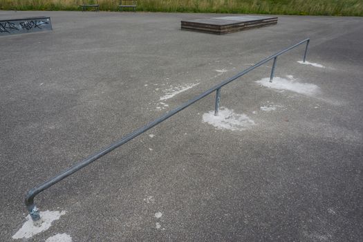 skateboard grind railing at the skate park upper view