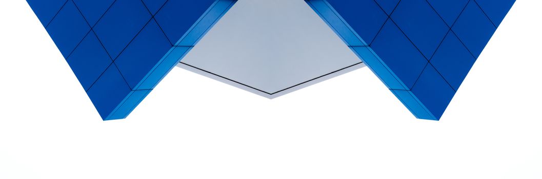 architectural abstract pattern fragment of a wall of blue modern building on a white background