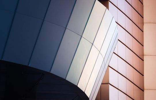 architectural abstract pattern fragment of a wall of blue modern building on a white background