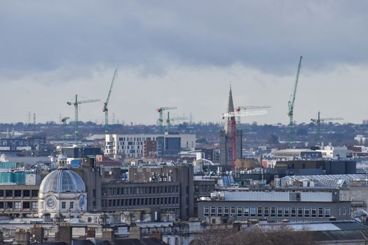 Dublin, Ireland - January 13, 2020: Dublin skyline with construction and lots of cranes across the city