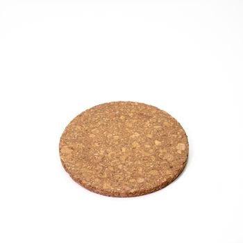 The close up of wooden cork coasters on white background.