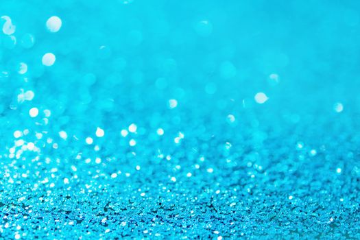 Defocused blue glitter background. blue abstract bokeh background. Christmas abstract background
