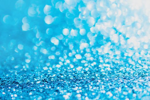 Defocused blue glitter background. blue abstract bokeh background. Christmas abstract background
