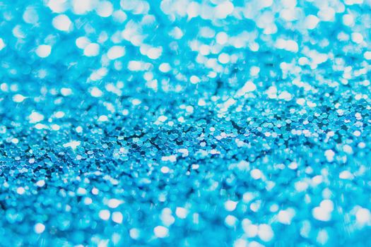 Defocused blue glitter background. blue abstract bokeh background. Christmas abstract background
