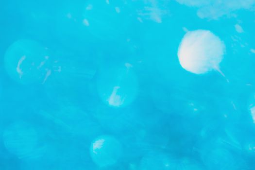 Defocused blue glitter background. blue abstract bokeh background. Christmas abstract background
