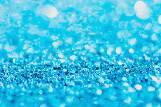 Defocused blue glitter background. blue abstract bokeh background. Christmas abstract background
