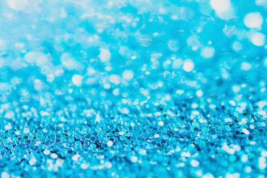 Defocused blue glitter background. blue abstract bokeh background. Christmas abstract background
