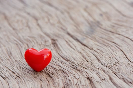 Valentines Day background with red hearts on plank wooden, copy space
