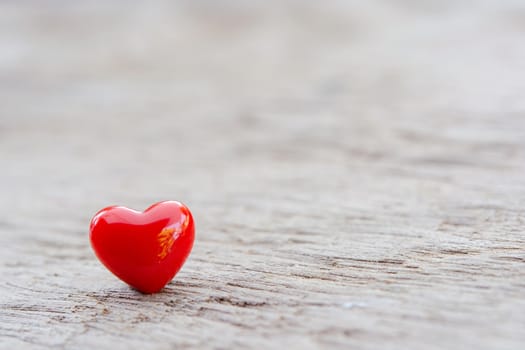 Valentines Day background with red hearts on plank wooden, copy space
