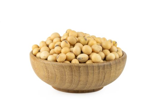 Soy beans in bowl wood isolated on white background with clipping path
