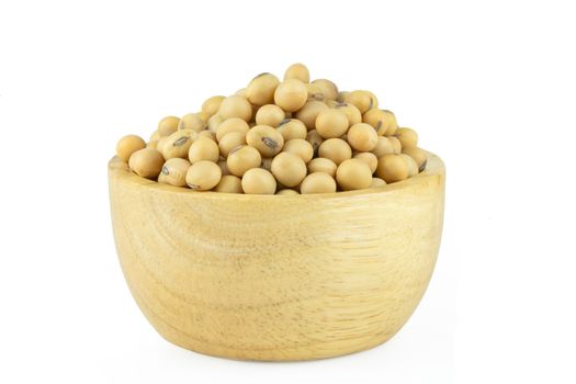 Soy beans in bowl wood isolated on white background with clipping path
