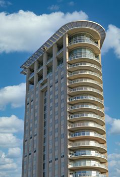 Modern condo tower with curved front