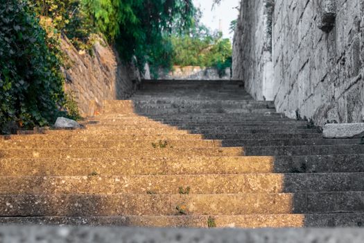 a very nice looking half colored half black and white stone stairs. photo has taken at izmir/turkey.