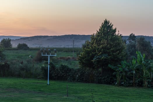 a very nice looking wide landscape shoot from a village - there is mountain and trees. photo has taken izmir/turkey.