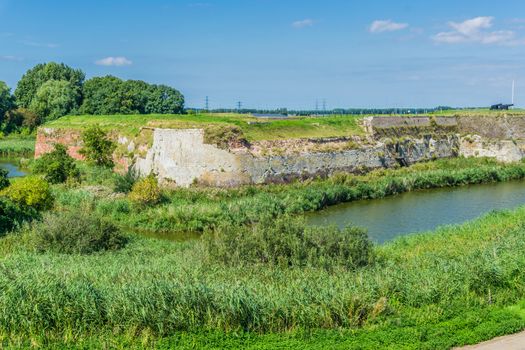 Old style stone wall in lake landscape