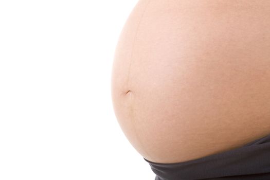 Closeup of pregnant woman at white background