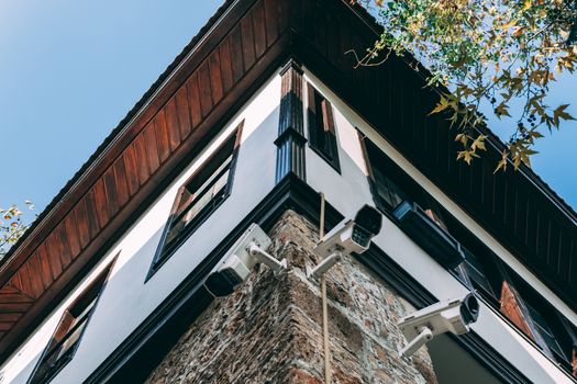 Surveilance cameras on the house's outside corner