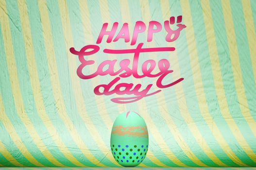 Easter eggs on wooden in blue and yellow wood wall.