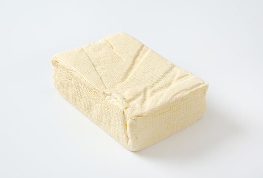 Block of fresh bean curd (tofu)